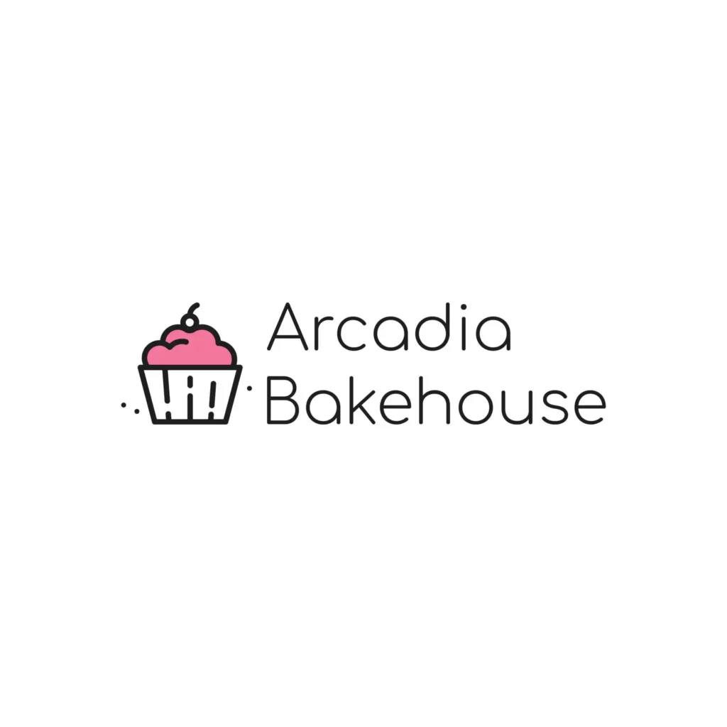 A simple modern logo showing a pink‑frosted cupcake with a cherry on top beside the text “Arcadia Bakehouse.”